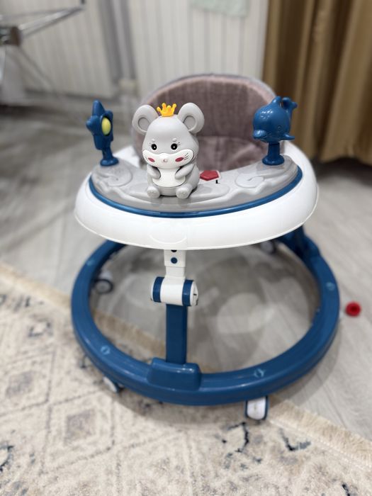 Детские ходунки на колесах