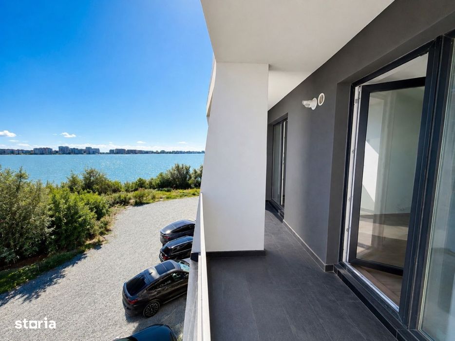 Apartament in prima linie la lac in complex rezidential cu piscina — fotografia 1