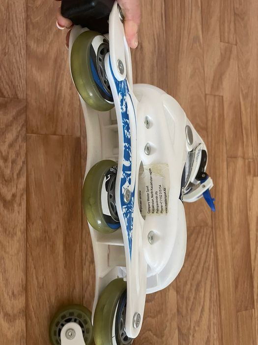 Роликовые коньки