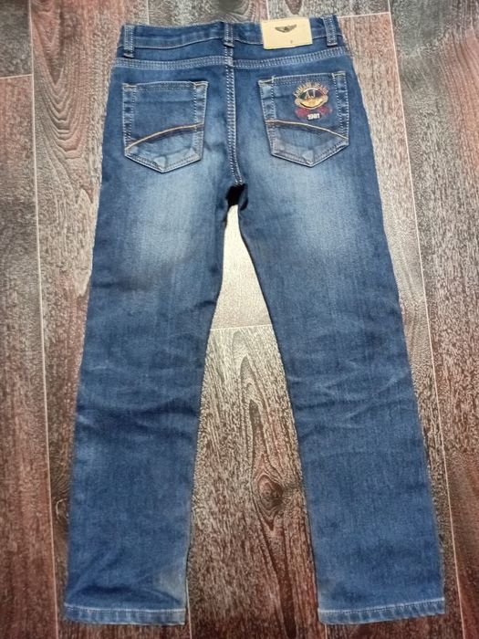 Большой пакет одежды на мальчика 7-8лет