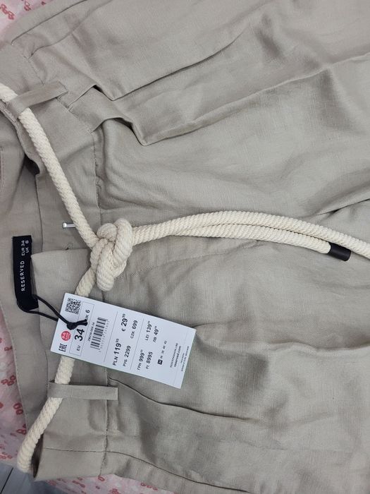Pantaloni din in noi cu etichetă