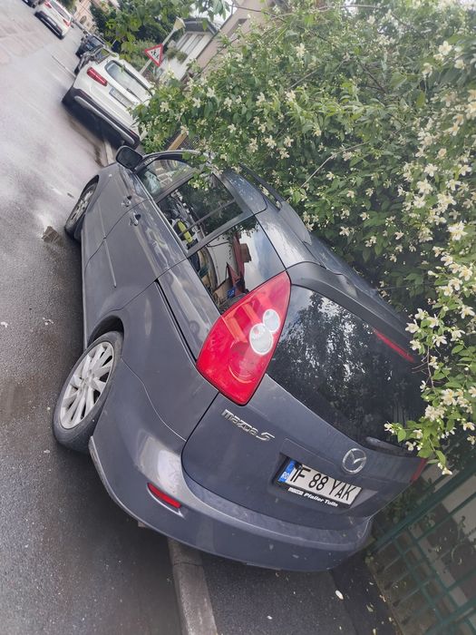Mazda 5.7locuri .