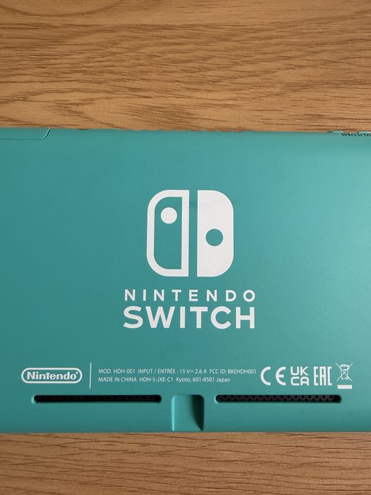 Nintendo Switch Lite тюркоазен + 3 игри + калъф
