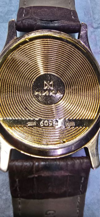 Золотые часы Ника