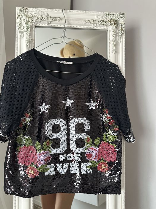 Ефектна пайетена блуза