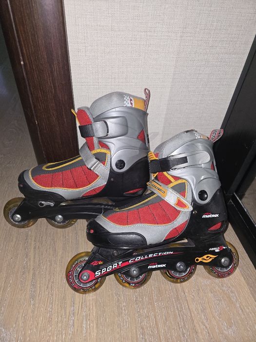Роликовые коньки
