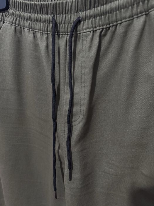 Новые темнозеленые брюки