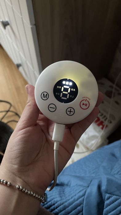 Электрический молокоотсос