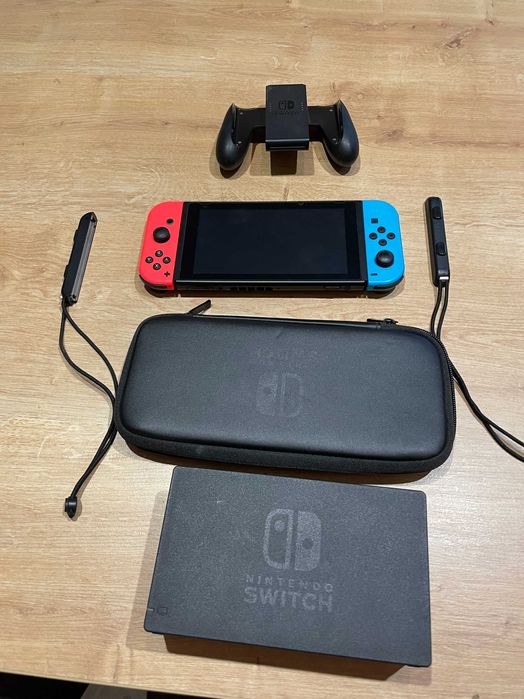 Nintendo Switch + Accesorii + 9 Jocuri + RingFit (incl. transport)