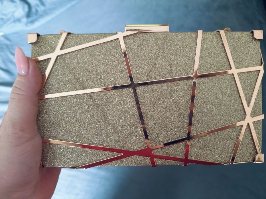 Продам клатч золотистого цвета