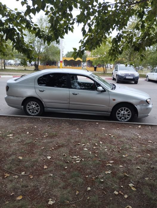 Нисан примьера р11