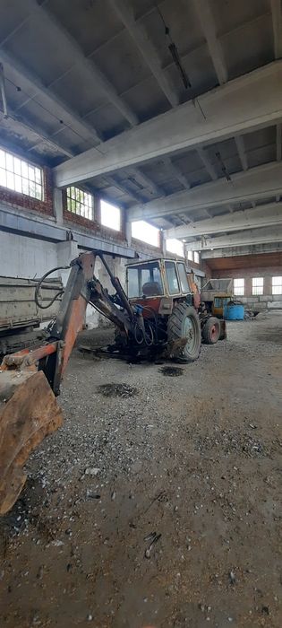 Трактор Экскаватор