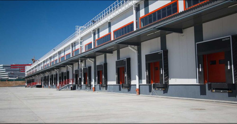 Секционные гаражные автоматические ворота ALUTECH немецкое качество