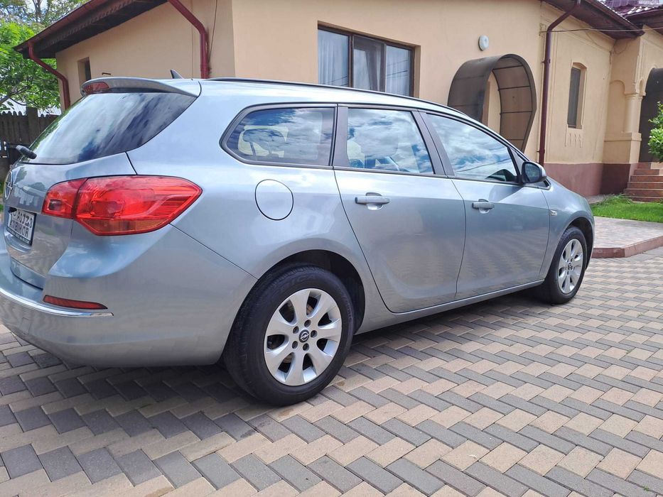 Autoturism Opel Astra J Sport Tourer,1.7 CDTI 110CP/an fabricatie 12/2013/182350 km/Navi/Intretinuta