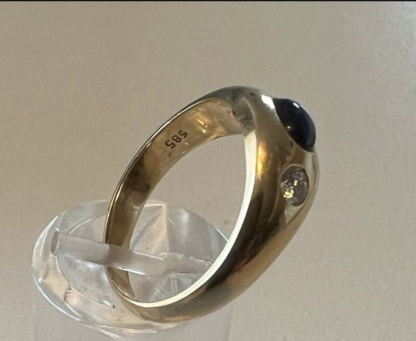 Inel aur 585 cu safir albastru 0,65 ctși doua diamante 0,21ct