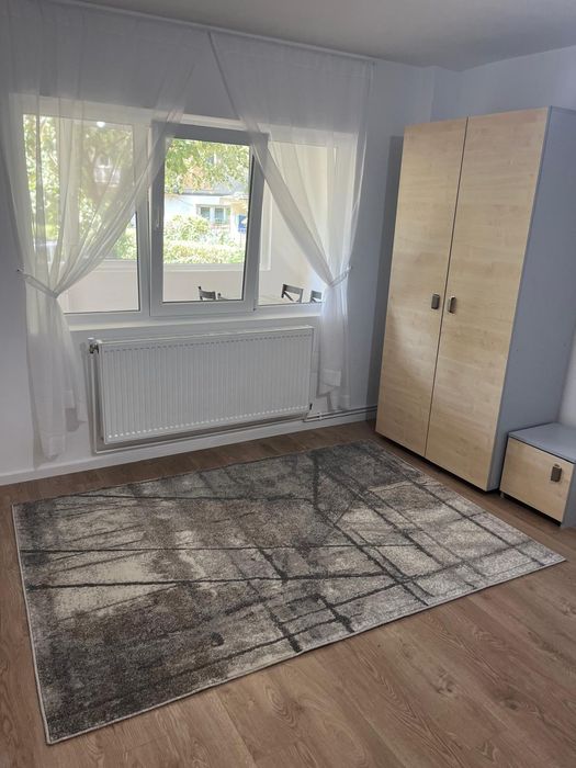 Închiriez apartament 2 camere decomandat,parter recent renovat