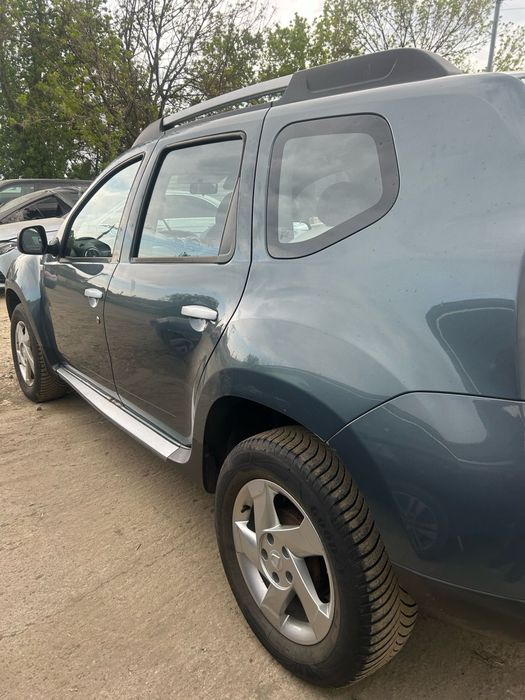 Aripă dreapta spate Dacia Duster
