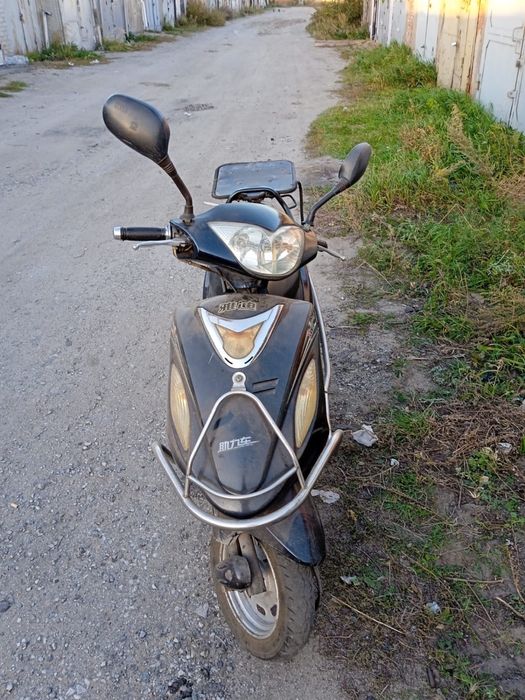 Скутер Рэйсер на ходу