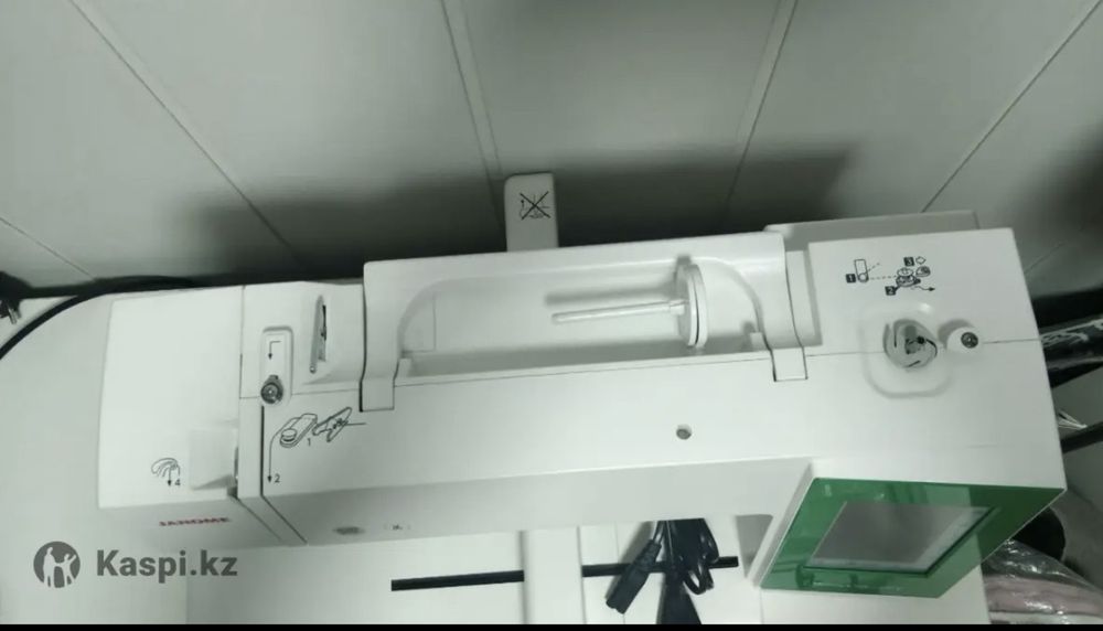 Вышивальная машина Janome Memory Craft 450E.