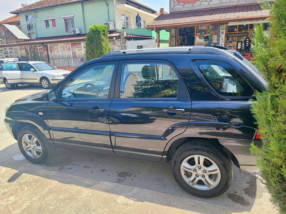 Кия спортидж бензин