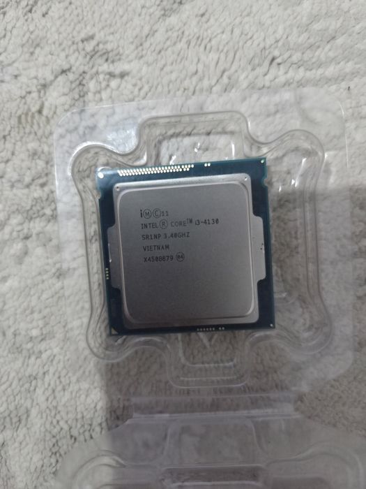 Intel Core i3-4130, 3.40 GHz, LGA 1150.