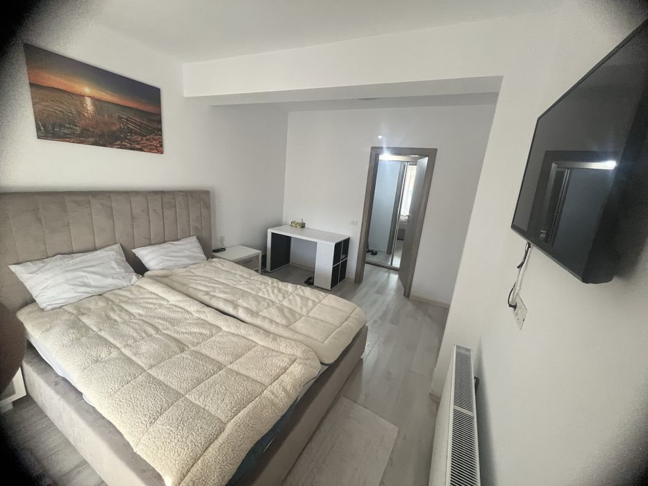 Inchiriez Ap 2 camere , 65 m2 , bloc nou , garaj privat   subsol