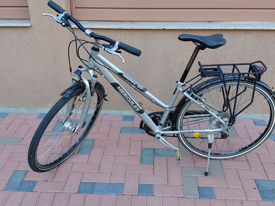 Vând bicicleta Trekking Dama-Barbat.