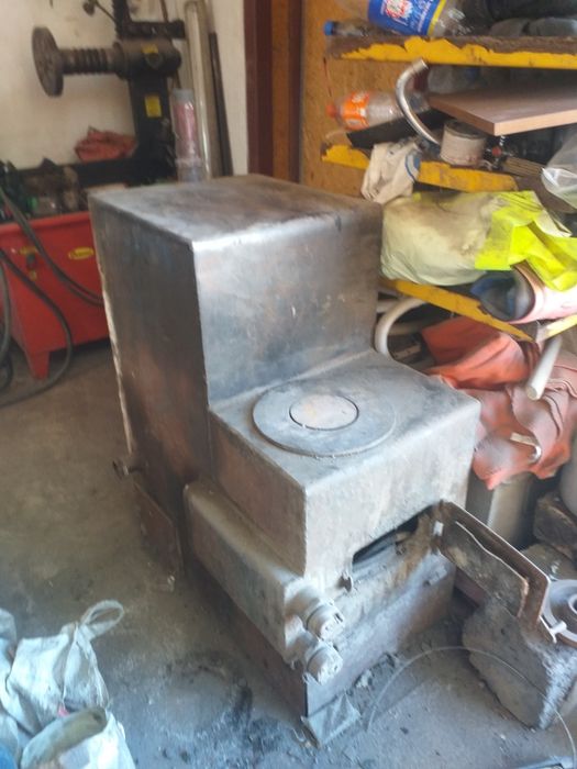 Кател отопления на твёрдом топливе