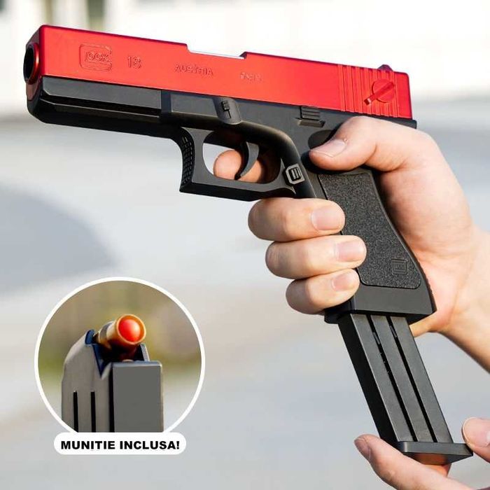 Pistol senzational trage cu cartuse si le arunca  lateral ca cel real.