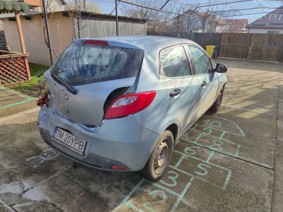 Mazda 2 / Motor 1.3 benzina / An 2008 avariata