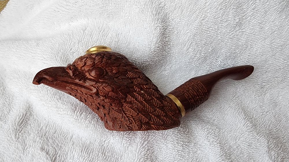 Трубка голова орла.