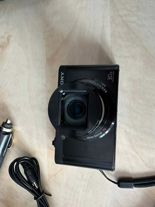 sony dsc-wx500 de culoare negru mat fata spate lateral unghi deschis