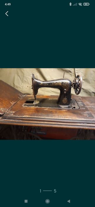 Mașina de cusut Singer