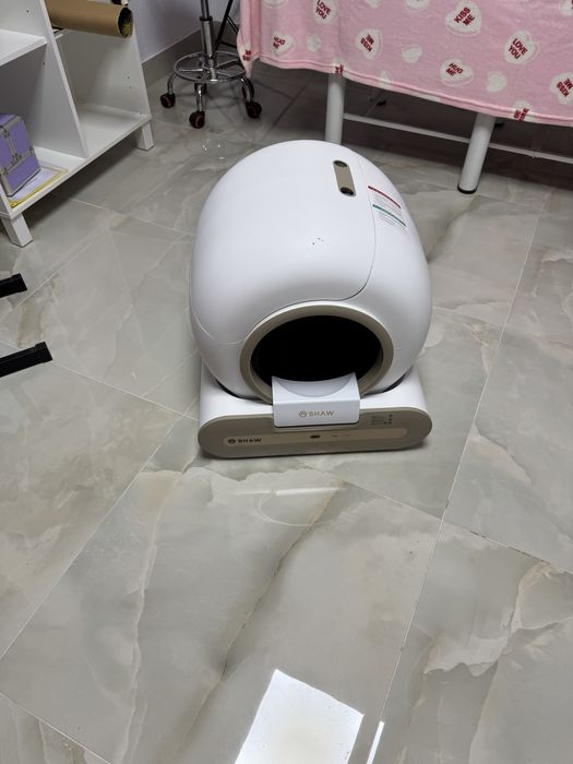 Vand litiera automata