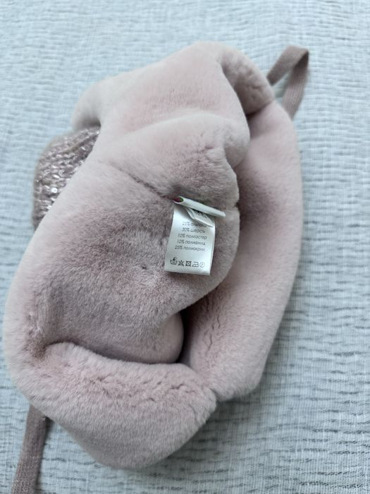 Продам зимнию шапку для девочки