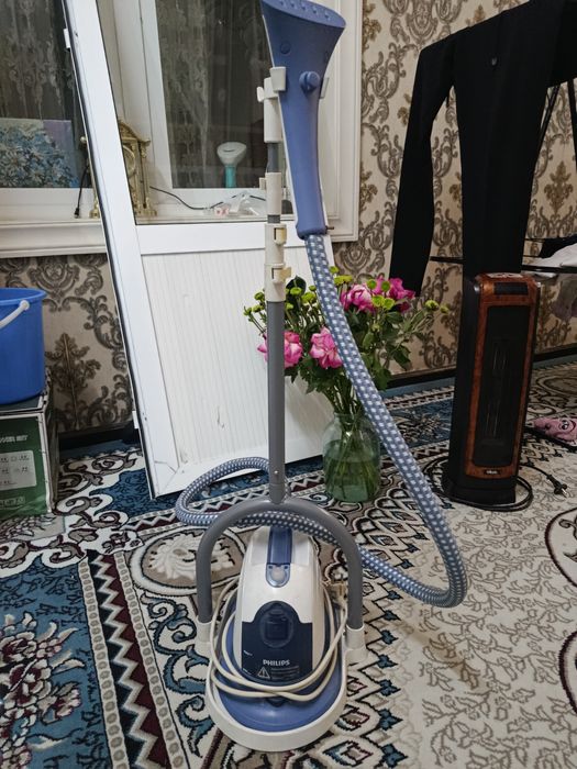 Правой утюг   Philips.