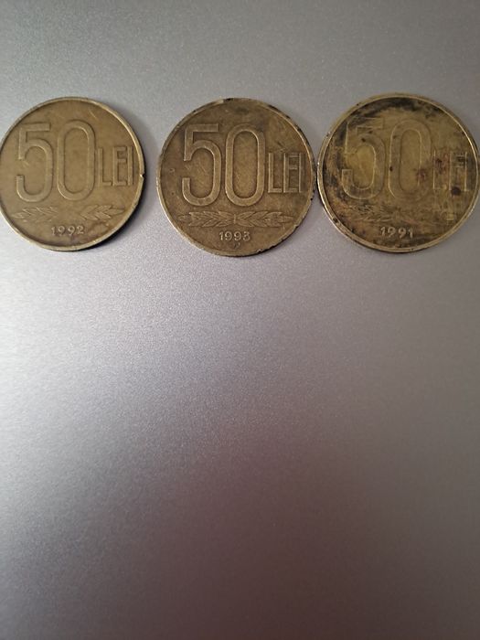 Vand monede 50/100 lei