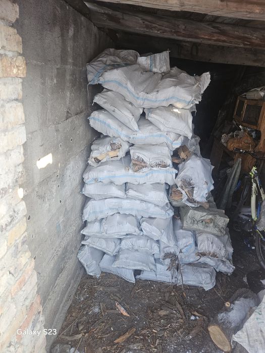 Дрова в мешках кубами