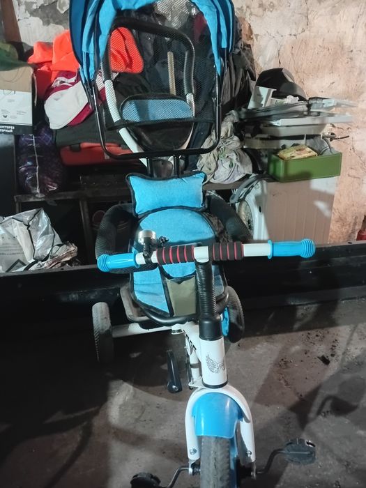 Продам велосипед с ручкой