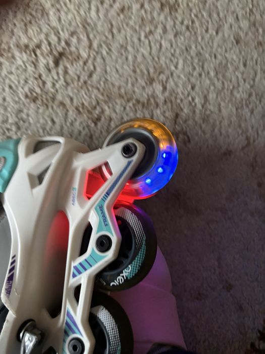 Role Oxelo FIT 3  mărimea 29 până la 32 roți luminoase