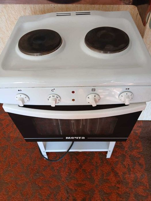 Электроплита с духовкой б/у