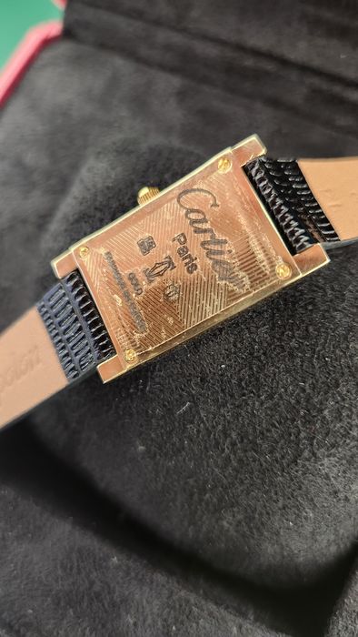 Золотые женские часы Cartier