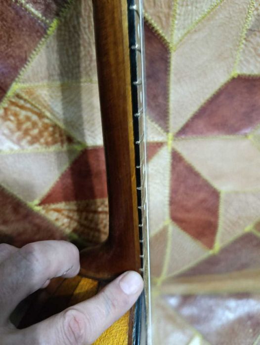 9-клёпочная домра