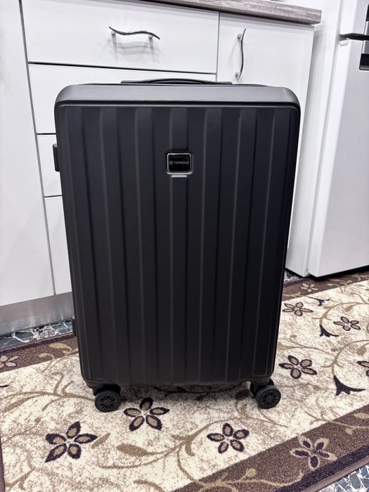 Topmove куфар с колелца