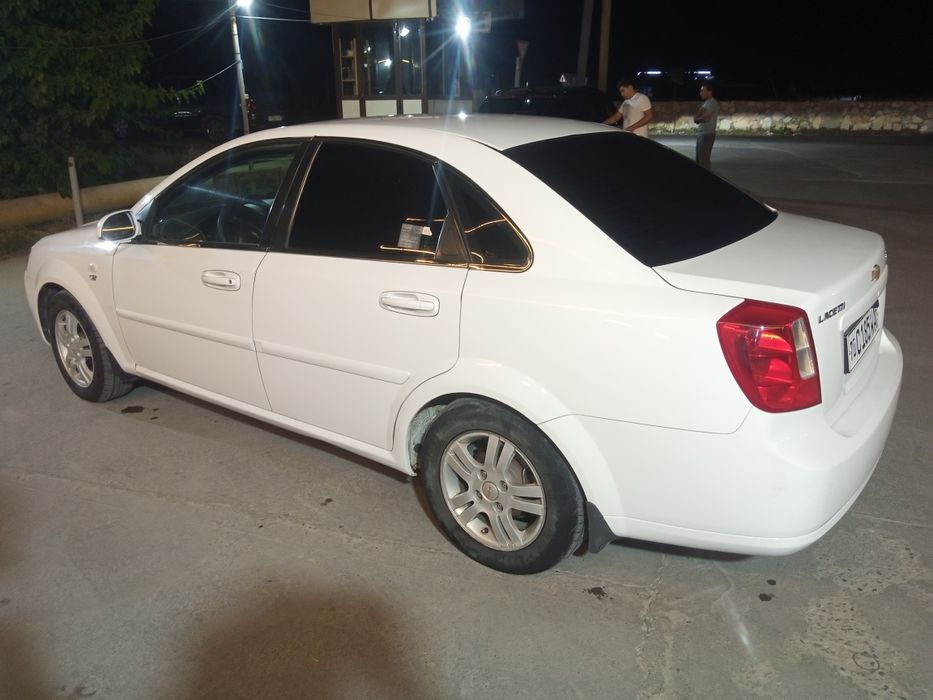 Ласетти 2011.  2 позится