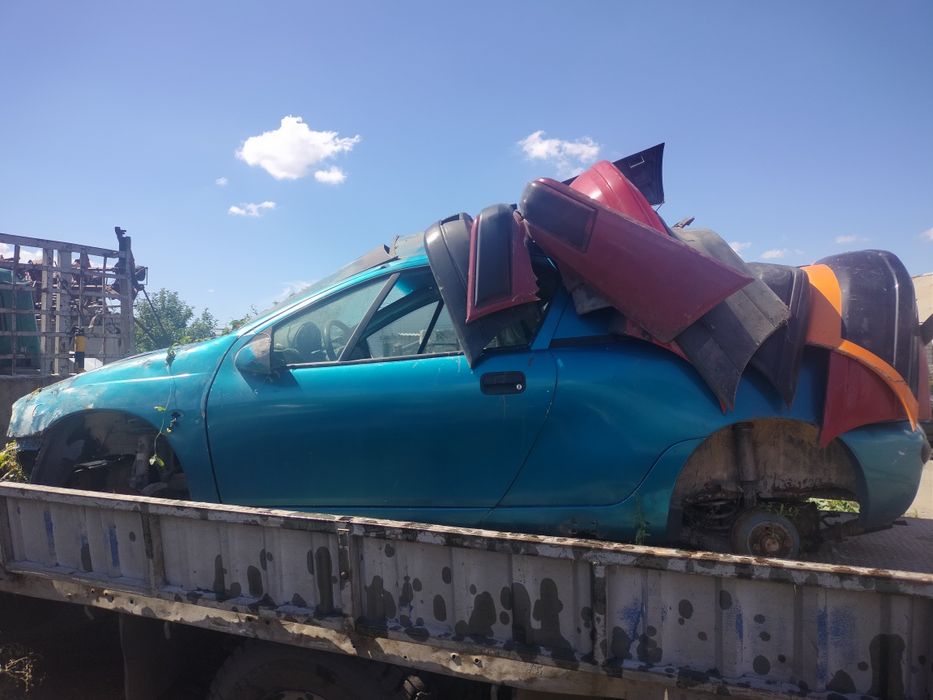 Опель тигра по запчастям