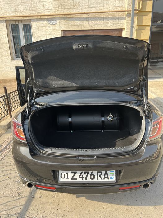 Mazda сотилади холати яхши