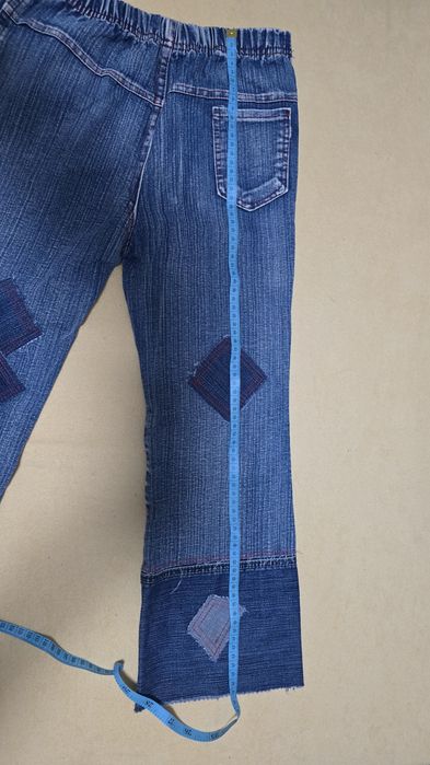 Джинсы и джинсовая куртка.