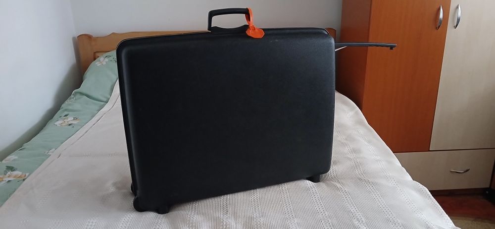 Valiză/troler mare Samsonite cu roți și tija de tragere , rigid