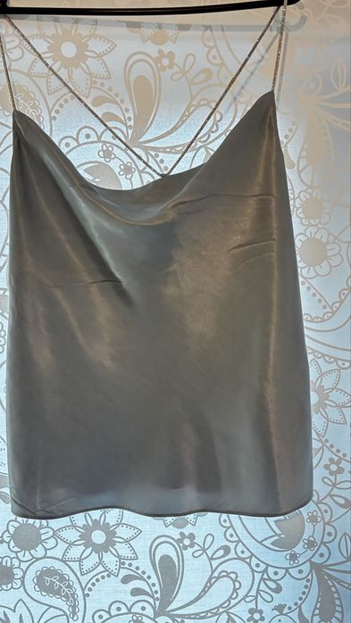 Светло син потник с блестящи презрамки